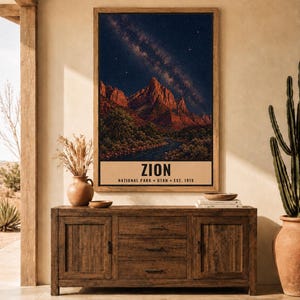 May include: A vertical wall art print featuring a night landscape of Zion National Park with a starry sky, red rock mountains, and a river. The text at the bottom reads ZION NATIONAL PARK UTAH EST. 1919. The print is a digital download file.