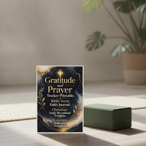 May include: A rectangular printable card featuring a dark navy blue and gold marble background with a glowing cross at the top. The text reads: Gratitude and Prayer Tracker Printable, Bible Verse Faith Journal, Christian Daily Devotional Template, Scripture Reflection Worksheet.