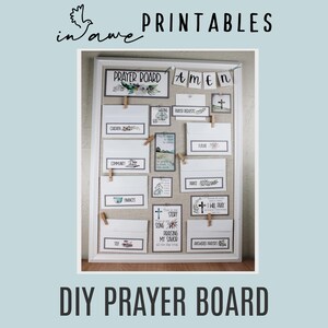May include: A white framed cork board with a printable prayer board set. The board has a variety of cards with different prayer topics, including "children", "community", "finances", "future", "prayer requests", "praise", "answered prayers", "story song", "praising my savior", and "I will pray". The board also has a sign that says "Amen" and a cross.