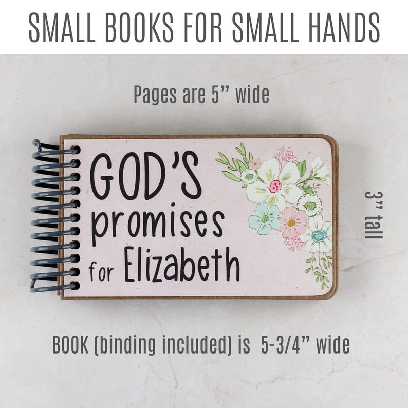 May include: A small, spiral-bound book with the text "GOD'S promises for Elizabeth" on a pink background. The cover features floral illustrations. The book is 5-3/4 inches wide, 3 inches tall, and the pages are 5 inches wide.