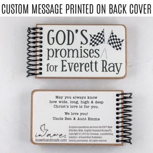 May include: A personalized notebook with a spiral binding. The top cover reads "GOD'S promises for Everett Ray" with checkered flags. The bottom cover includes a message, "May you always know how wide, long, high & deep Christ's love is for you."