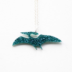 Collar mediano de dinosaurio pterodáctilo con purpurina