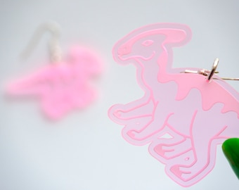 Neon parasaurolophus dinosaur dangly earrings