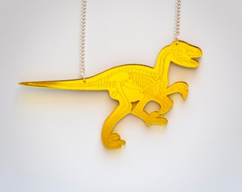 Colar com esqueleto de dinossauro Velociraptor