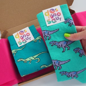 T-Rex dinosaur socks turquoise and lilac pair of socks image 4