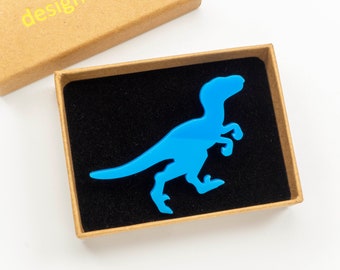 Raptor dinosaur brooch