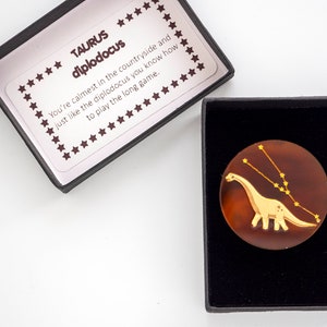 TAURUS diplodocus dinosaur zodiac brooch