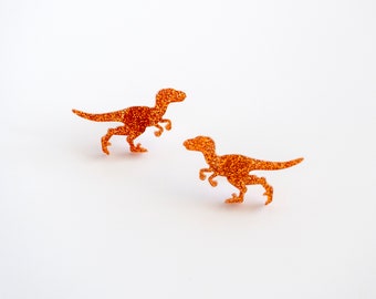 Glitter raptor dinosaur stud earrings