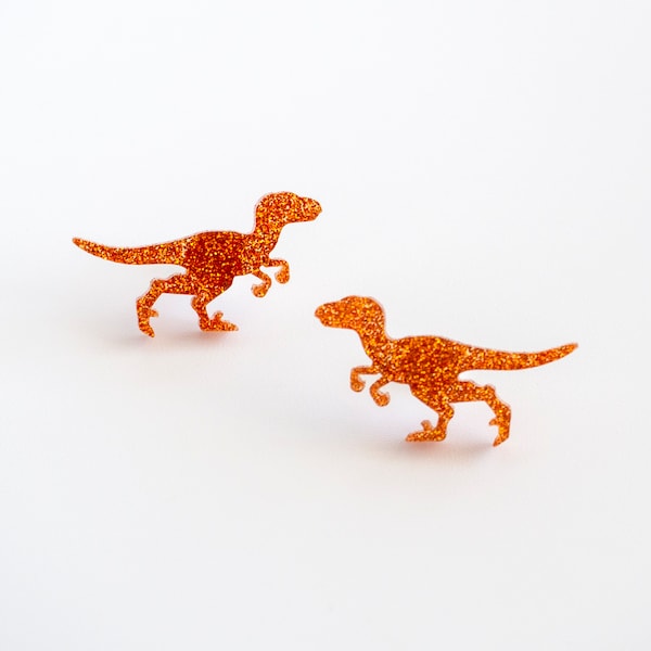 Glitter raptor dinosaur stud earrings