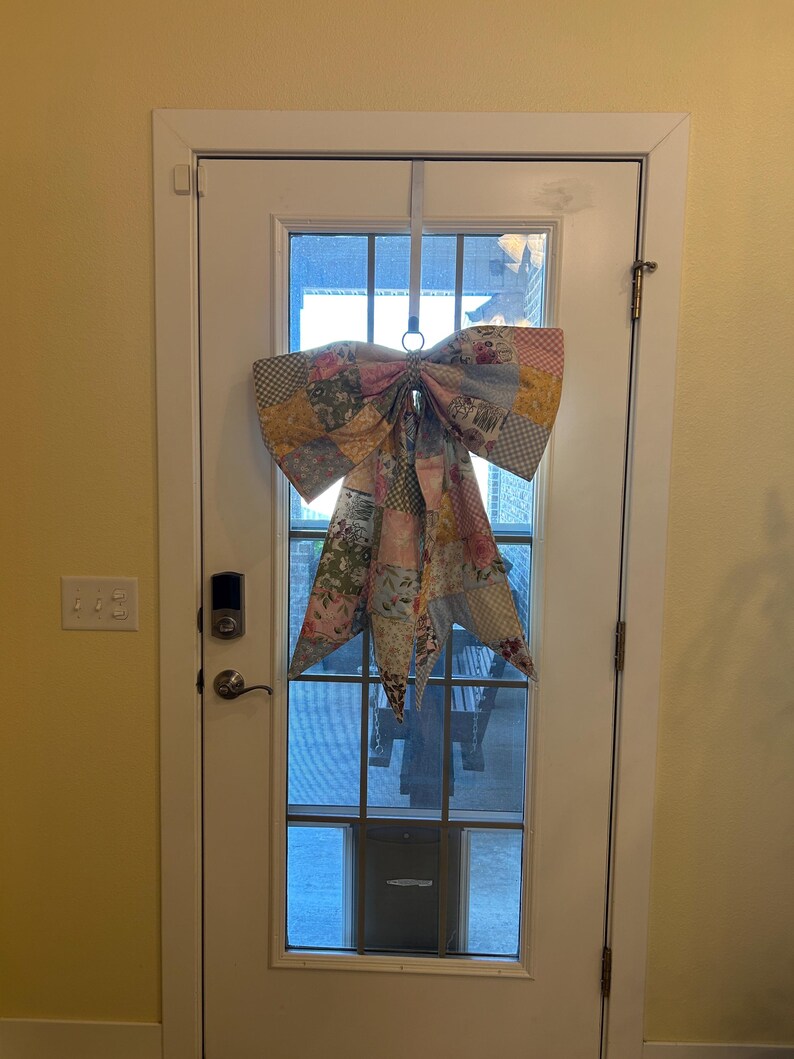 Reference to size hanging on a door.