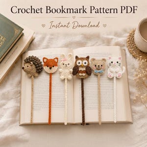 May include: Six crochet bookmarks featuring animal heads including a hedgehog, fox, rabbit, owl, bear, and cat. Each bookmark has a long, thin, crocheted tail extending from the animal head. The text reads Crochet Bookmark Pattern PDF.