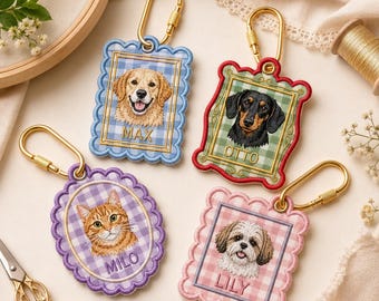 May include: Four embroidered keychains with gold-tone carabiners. Each features a pet portrait on a gingham background with a scalloped border. The keychains are labeled with the names Max, Otto, Milo, and Lily in stitched lettering.
