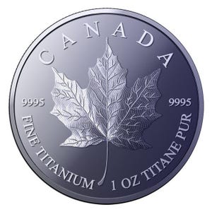 May include: A circular silver-toned titanium coin featuring a detailed maple leaf at the center. The text CANADA is arched at the top, with 9995 on both sides. The bottom text reads FINE TITANIUM 1 OZ TITANE PUR, indicating the metal and weight.