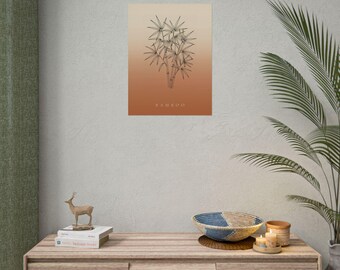 Op de afbeelding: Een rechthoekige wandkunstprint met een zwarte lijntekening van een bamboeplant, gecentreerd op een verticale gradiëntachtergrond die verloopt van lichtbeige aan de bovenkant naar diep terracotta oranje aan de onderkant met het woord BAMBOO eronder.