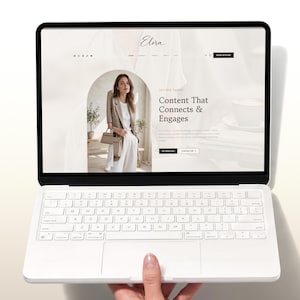 Könnte beinhalten: Ein weißer Laptop zeigt eine Website mit dem Titel Elora und einem Hauptbereich, der eine Person in einem beigen Blazer und weißem Rock zeigt. Der Text lautet Content That Connects & Engages, mit Schaltflächen für My Services und Contact Me.