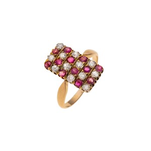 May include: A gold ring featuring a rectangular head set with alternating rows of round-cut red rubies and clear white diamonds. The band is smooth and polished gold, supporting the multi-stone cluster arrangement on the top of the ring.