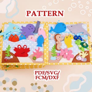 May include: A felt quiet book pattern featuring two open pages with an underwater theme. The pages display various sea creatures including a dolphin, octopus, crab, whale, shark, seahorse, and turtle in felt, with the text PATTERN and PDF/SVG/FCM/DXF.