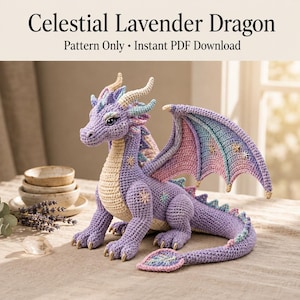 May include: A crocheted lavender dragon toy with cream-colored underbelly, horns, and claws. The wings feature a gradient of purple, pink, and blue with embroidered star accents. Text at the top reads: Celestial Lavender Dragon Pattern Only.