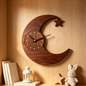 May include: A crescent moon-shaped wall clock crafted from dark brown wood with a visible grain. The clock face features small circular gold markers for hours and two dark hands. A small wooden star is attached to the upper right of the moon.