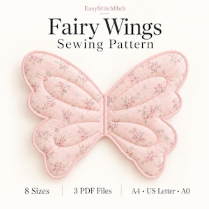 May include: A Fairy Wings Sewing Pattern by EasyStitchHub featuring a light pink fabric with a floral and star print. The design is shaped like butterfly wings with quilted sections and pink trim. Text includes 8 Sizes, 3 PDF Files, A4, US Letter, A0.