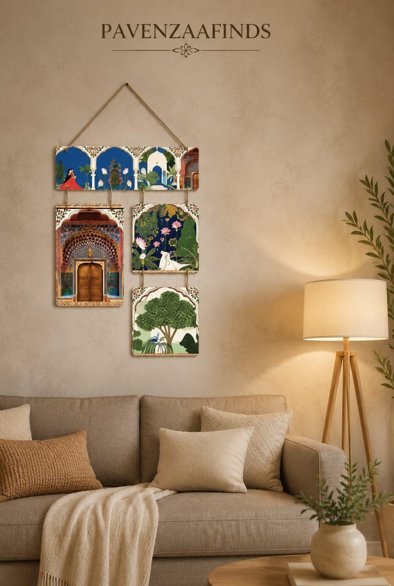 May include: A wall hanging consisting of four rectangular panels suspended by twine. The top panel features an architectural archway with a figure in red. Below are three square panels depicting a wooden door, lotus flowers, and a green tree.