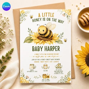 Könnte beinhalten: Eine Babyparty-Einladungskarte mit einer Aquarellillustration einer Biene auf einer Sonnenblume. Der Text lautet A LITTLE HONEY IS ON THE WAY, BABY HARPER, A SWEET LITTLE ONE IS BUZZING OUR WAY sowie Details für den 27. September 2026.
