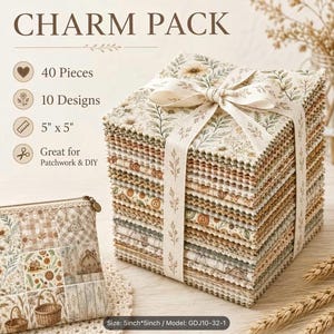 May include: A charm pack of 40 fabric squares measuring 5 inches by 5 inches, featuring 10 floral and rustic designs. The stack is tied with a cream ribbon. A matching zippered pouch with a patchwork print sits beside the fabric stack.