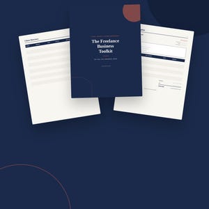 May include: A 12-page digital business workbook titled The Freelance Business Toolkit. The cover is dark blue with white text and a red circle accent. Two interior pages are visible, one labeled Client Directory and the other an invoice template.
