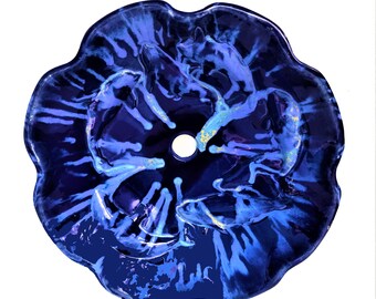 Deep vibrant blue handmade bathroom sink, with a Hawaiian Humpback Whales relief 3D design on the surface of the sink.