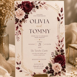 May include: A wedding invitation card featuring a cream background with a gold geometric frame and deep burgundy and blush floral accents. The text reads Olivia and Tommy, Saturday October 21 2026 at 5:00 PM, The Garden Estate, 1234 Willow Creek Lane, Austin, Texas 78701.