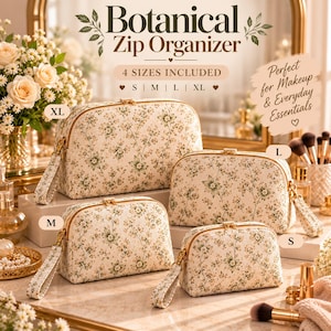 Puede incluir: Cuatro organizadores con cremallera en forma de cúpula en tallas S, M, L y XL, con tela color crema y un patrón floral botánico repetitivo en verde y marrón, cremalleras doradas y correas de muñeca a juego en cada bolsa.
