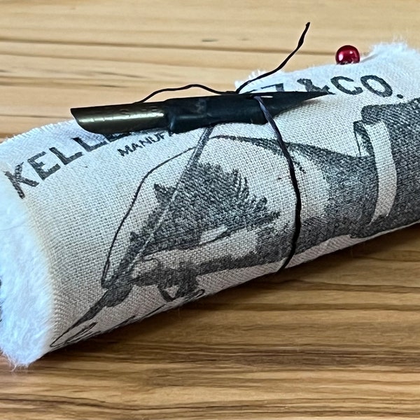 Keller Kurtz Co - Vintage Inspired Hand-Stamped Tea-Dyed and Frayed Muslin Trim Around A Black Wooden Clothespin - Junk Journal Art Trim