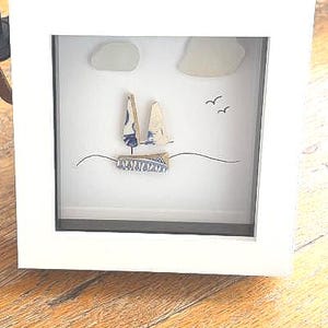 Handmade Sea Loch glass and pottery boat art. Complimentary gift wrapping included in price.