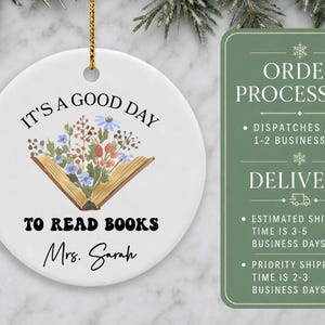 Ceramic ornament with "It's a good day to read books Mrs. Sarah" and floral book design.