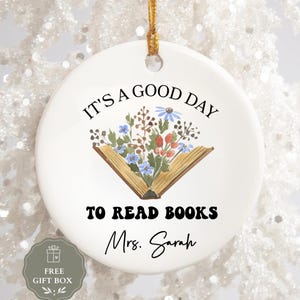 Ornament with text "It's a good day to read books" and "Mrs. Sarah".