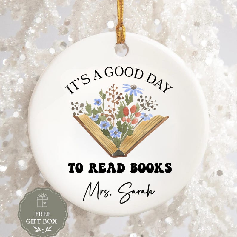 Ornament with text "It's a good day to read books" and "Mrs. Sarah".