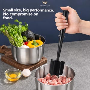May include: A black meat chopper tool with a long handle and a multi-blade head, positioned inside a stainless steel bowl containing ground meat. Text reads: Small size, big performance. No compromise on food. Westport Mart logo is visible.