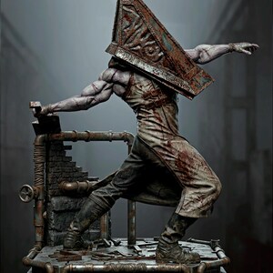 May include: A detailed figurine of the Pyramid Head character from Silent Hill 2, featuring a large, rusted, triangular metal helmet, a blood-stained apron, and muscular arms. The figure stands on a base with pipes and the text SILENT HILL 2.