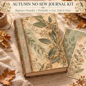 May include: An Autumn No-Sew Journal Kit featuring a book with a vintage-style cover decorated with botanical illustrations of leaves and flowers, alongside two rectangular paper inserts with matching floral patterns and aged parchment textures.