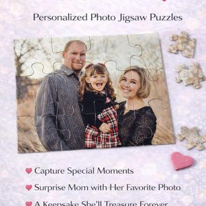 May include: A personalized photo jigsaw puzzle featuring a family portrait. The puzzle is surrounded by scattered pieces and a pink heart. Text reads "Turn Your Favorite Memory into a Gift for Mom."