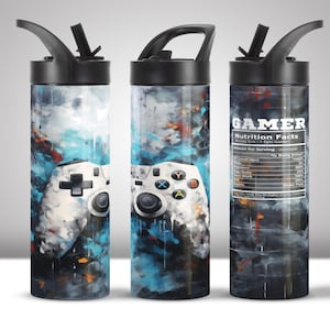 May include: Three stainless steel water bottles with a gamer theme. The bottles have a black lid with a flip-top straw. The center bottle has a white and blue abstract design with a video game controller. The right bottle has a black and white abstract design with the text "GAMER Nutrition Facts" and a list of nutritional facts.