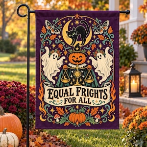 May include: A rectangular garden flag with a dark purple background featuring a central pumpkin-headed figure holding scales, flanked by two white ghosts. The design includes a black cat on a crescent moon, moths, and the text EQUAL FRIGHTS FOR ALL.