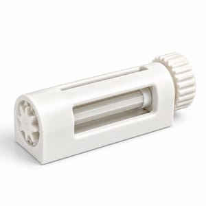 May include: A white plastic tube squeezer featuring a cylindrical body with a horizontal slot for inserting a tube. It includes a rotating knob on one end with a gear mechanism to wind the tube and dispense contents through the opening.