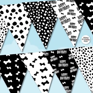 May include: Black and white bunting with a dog bone and dalmatian spot pattern. The bunting has the text "Happy Birthday!" repeated on each flag.