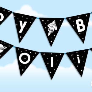 May include: Black and white bunting with stars and space-themed illustrations. The bunting spells out "Happy Birthday".