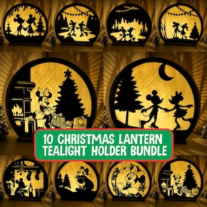Pode incluir: Um conjunto de 10 lanternas circulares de Natal para velas com silhuetas pretas recortadas de ratos de desenhos animados em várias cenas festivas, incluindo patinagem, junto a uma lareira e árvores de Natal com luz de fundo quente.