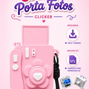 May include: A pink camera-shaped holder with a flower-shaped lens, a heart-shaped button, and a black wrist strap. The text reads Cámara Porta Fotos, CLICKER, DESCARGA, FÁCIL Y RÁPIDA, ARCHIVO STL, and FORMATO PARA IMPRESORA 3D, with two mechanical switches.