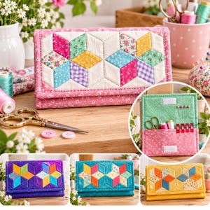 May include: A quilted fabric needle case featuring a star-patterned exterior in pink, yellow, blue, and green floral and gingham prints. The interior includes a green fabric panel with pockets for scissors, thread spools, and sewing pins.