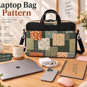 May include: A rectangular laptop bag featuring a patchwork design of green, orange, and cream fabric with various geometric and floral patterns. The bag has black handles, a black top border, and a black shoulder strap with metal hardware.