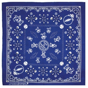 May include: Blue bandana with white designs, including dancing bears, lightning bolts, peace signs, and the words "GOOD OL GRATEFUL DEAD." The border features a decorative pattern. Made of 100% cotton.